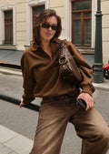 Men's quarter‑zip polo sweatshirt, front view